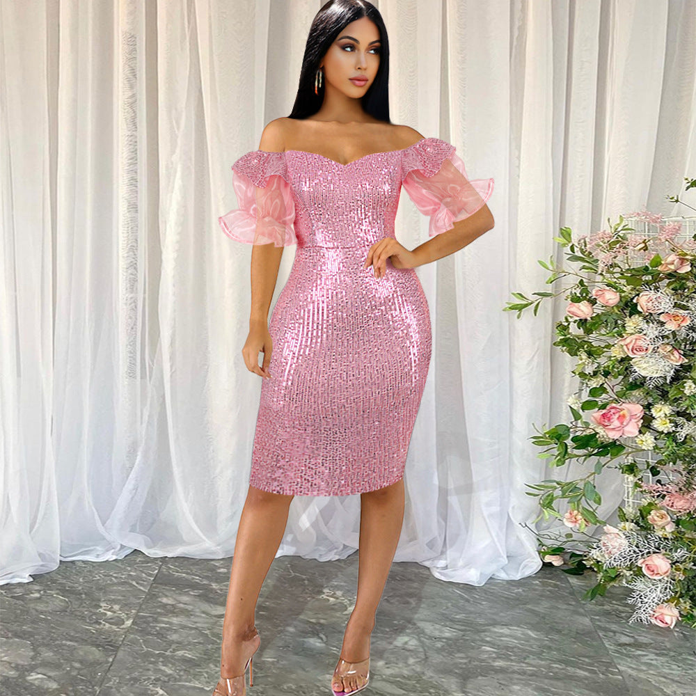 Damen glamouröses Abendkleid mit Glitzer und transparenten Puffärmeln Echo Archiv