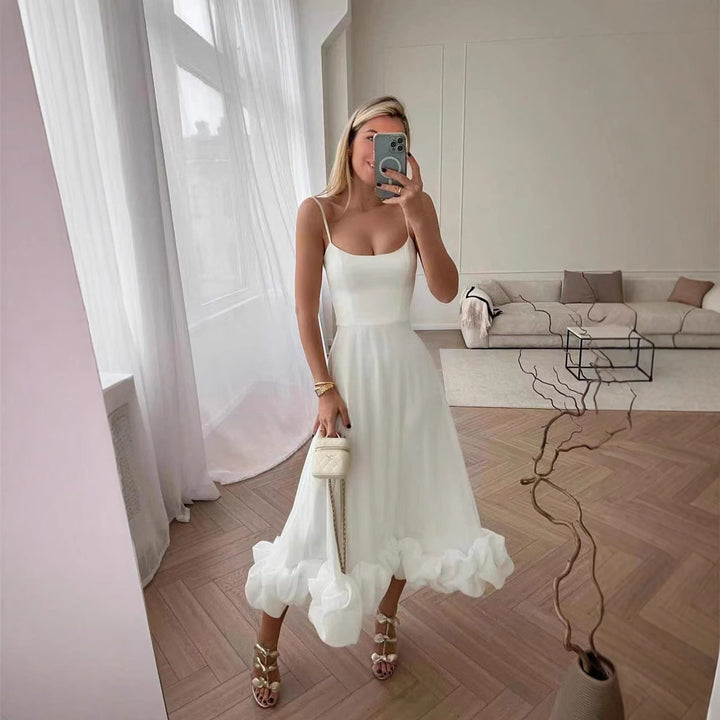 Damen Midi-Kleid mit zarten Spaghetti-Trägern und voluminösem Rüschensaum Echo Archiv