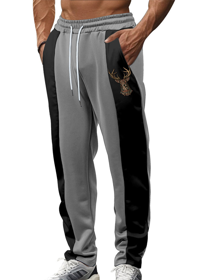 Herren nan sportive Trackpants mit seitlichen Kontrastbahnen elastischem Bund Kordelzug und Hirschstickerei Echo Archiv