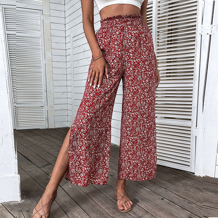 Damen Weite hochgeschnittene Palazzo‑Hose mit floralem Muster und seitlichem Beinschlitz Echoarchiv