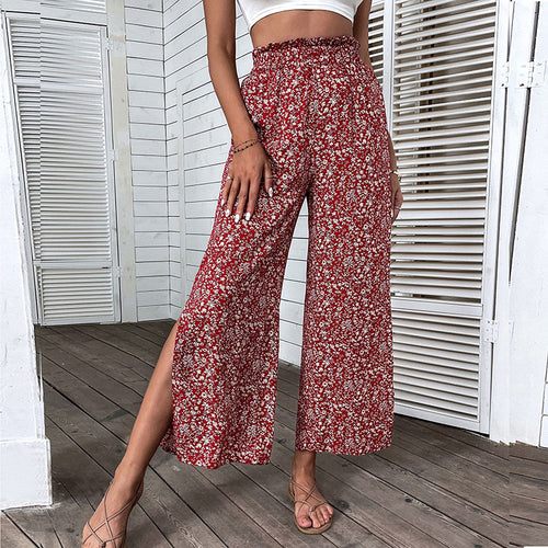 Damen Weite hochgeschnittene Palazzo‑Hose mit floralem Muster und seitlichem Beinschlitz Echoarchiv