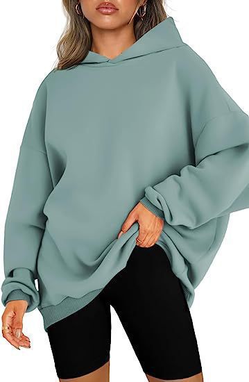 Damen nan oversized Kapuzenpullover im Boxy-Cut mit innen angerautem Fleece, überschnittener Schulter und verlängertem Rückenteil Echo Archiv