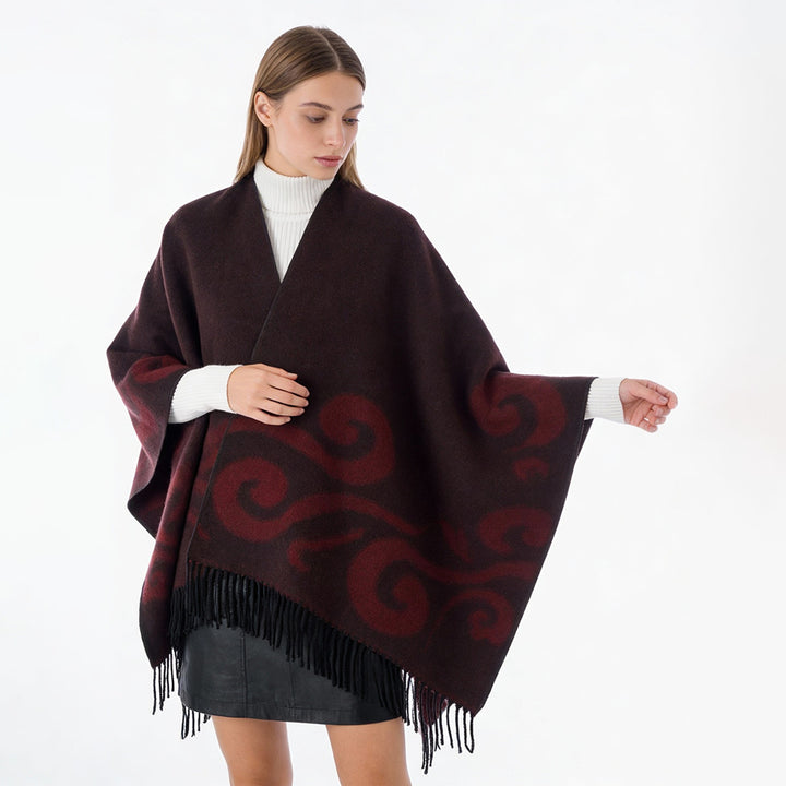 Damen Wollmix-Poncho mit Jacquard‑Wirbelmuster, V-Ausschnitt und Fransen – Avérine