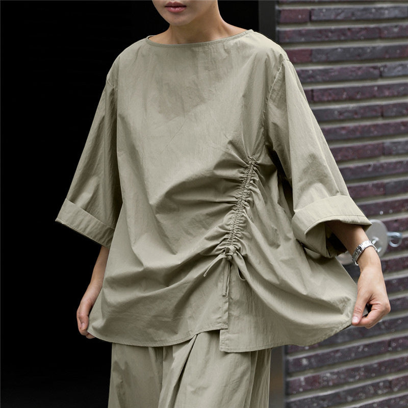 Damen Oversize-Bluse mit seitlicher Kordel‑Raffung, U‑Boot‑Ausschnitt und weiten Ärmeln Echoarchiv