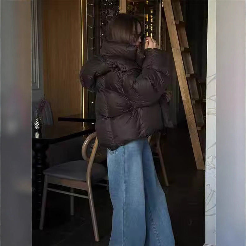 Damen Kurze Voluminöse Steppjacke mit hohem Schlauchkragen und Kapuze Echoarchiv