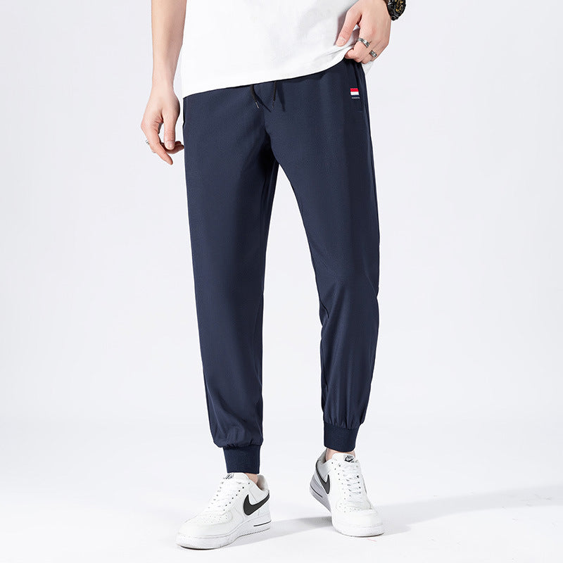 Herren Sportliche Jogginghose mit elastischem Bund und Seitentaschen Echo Archiv