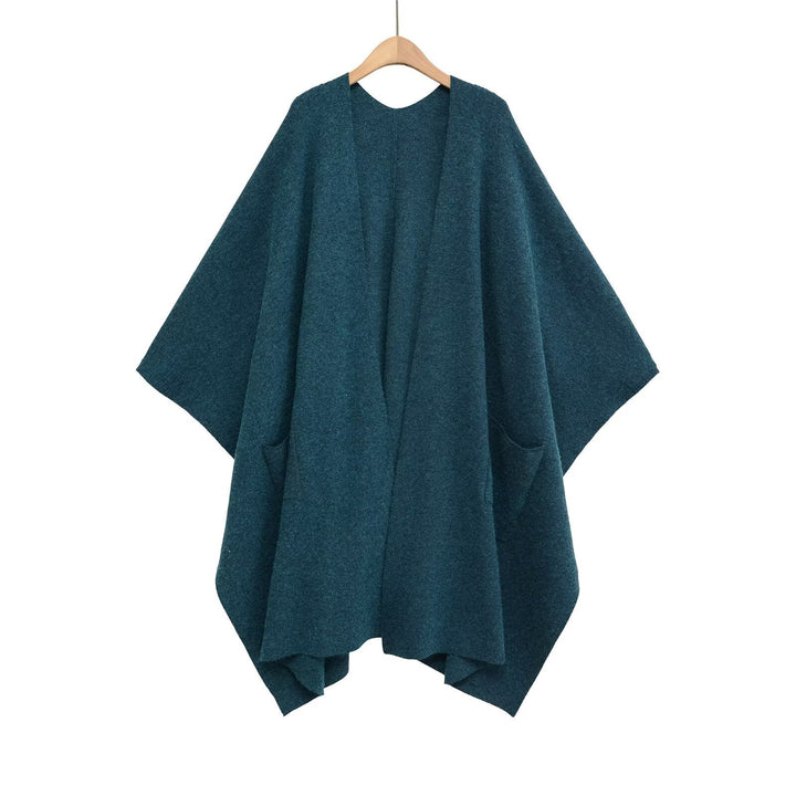 Damen Oversize Strickponcho mit Eingrifftaschen und asymmetrischem Saum Echo Archiv