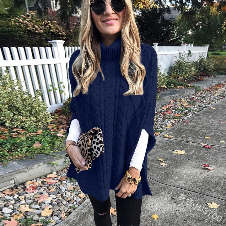 Damen nan kastiger Strickponcho mit hohem Rollkragen, Zopfstruktur und seitlichen Schlitzen Echo Archiv