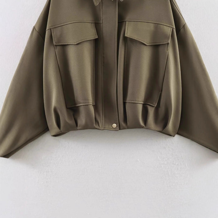 Damen oversized Utility-Jacke mit übergroßen Pattentaschen, überschnittener Schulter und elastischem Bund – Célinea