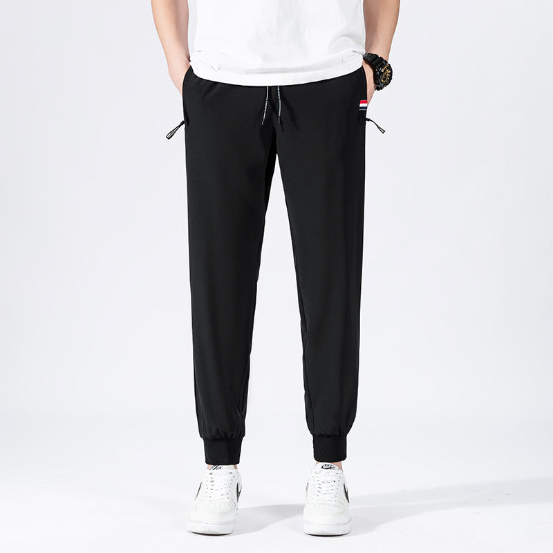 Herren Sportliche Jogginghose mit elastischem Bund und Seitentaschen Echo Archiv