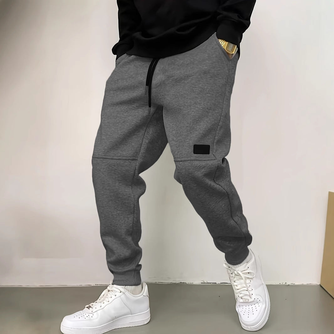 Herren Sportliche Jogginghose mit seitlichen Reißverschluss-Details Echoarchiv