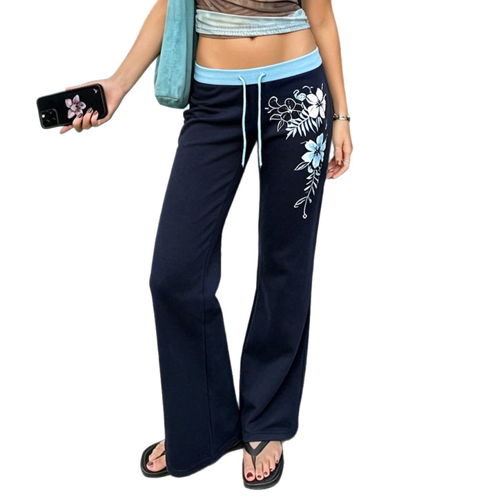Damen Ausgestellte Lounge-Hose mit Rippbund, Kordelzug und floralem Print – Avélisse
