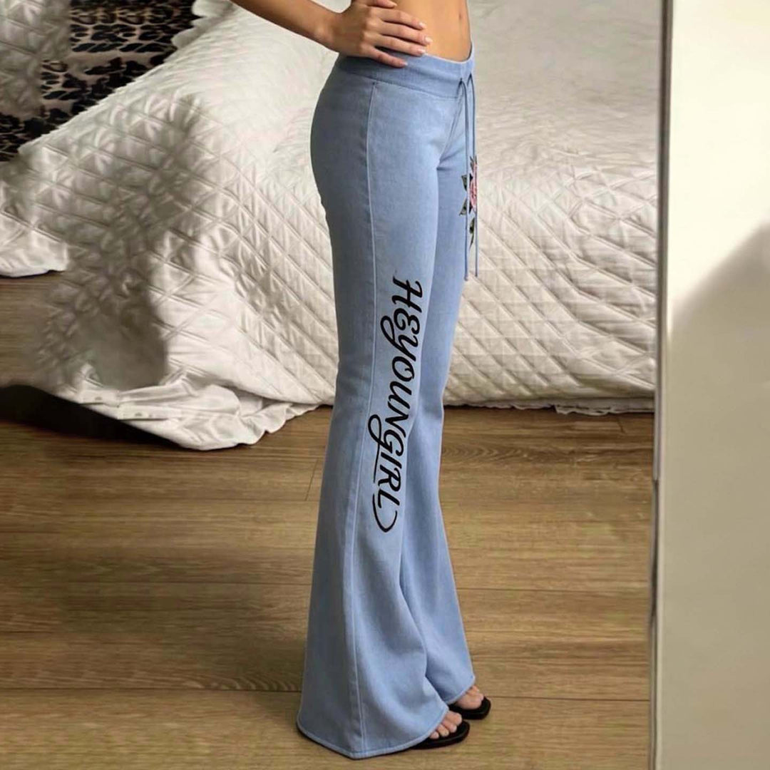 Damen nan ausgestellte Jersey-Sweathose mit Kordelzug, floralem Seitenprint und Statement-Schriftzug Echo Archiv