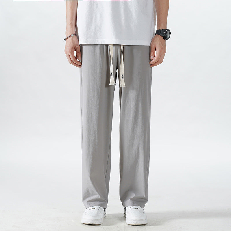 Herren Leichte Relax-Fit-Loungehose aus atmungsaktivem Jersey mit elastischem Tunnelbund, breitem Kordelzug & geripptem Beinabschluss Echoarchiv