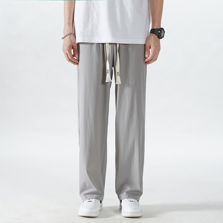 Herren Leichte Relax-Fit-Loungehose aus atmungsaktivem Jersey mit elastischem Tunnelbund, breitem Kordelzug & geripptem Beinabschluss Echoarchiv