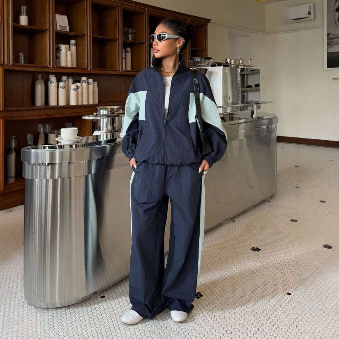 Damen Cropped-Trainingsjacke und hochgeschnittene Breitbein-Jogginghose im Set Echo Archiv