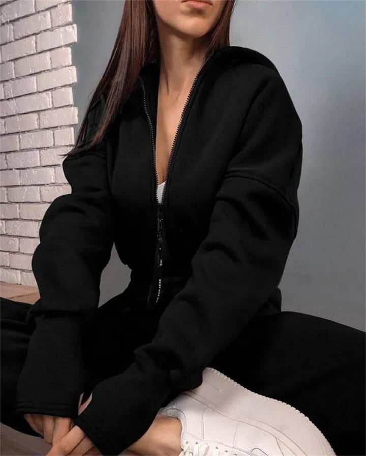 Damen Taillierter Kapuzen-Sweat-Jumpsuit mit Reißverschluss und elastischem Taillenbund – Solévia