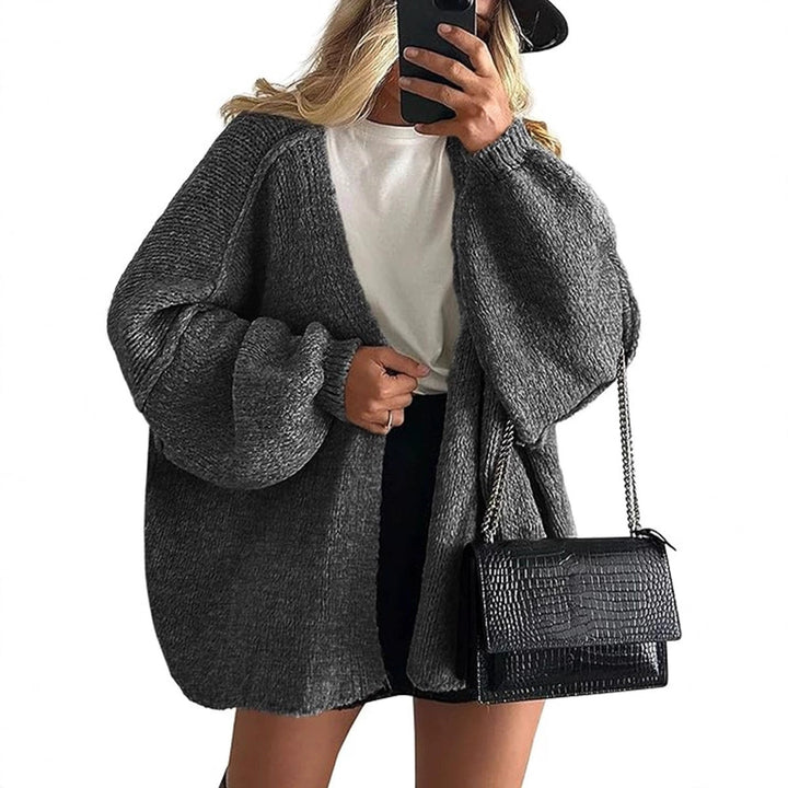 Damen Oversize Strickcardigan mit Ballonärmeln und offener Front Echoarchiv