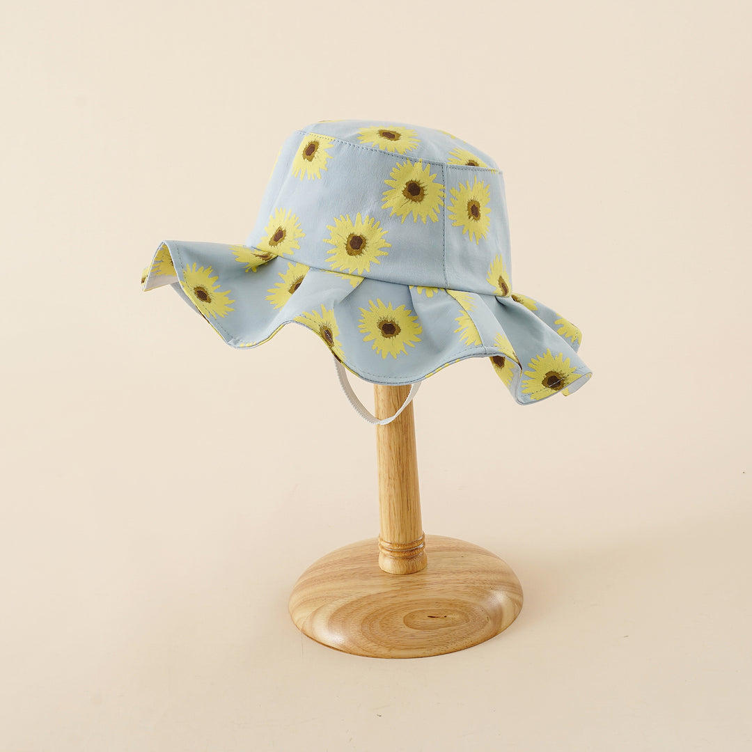 Damen Sonnenhut mit breiter Rüschenkrempe und Sonnenblumen‑Print – Avérine