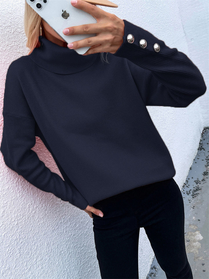 Damen Gerippter Rollkragenpullover mit Oversize-Schnitt und Zierknopfmanschetten Echoarchiv