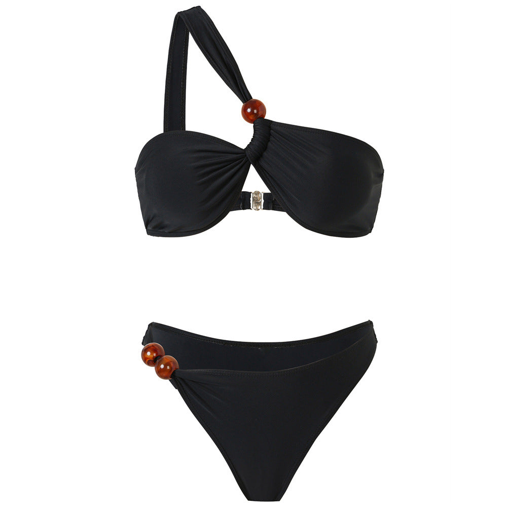 Damen Bikini-Set mit asymmetrischem Halter-Neck und dekorativen Hosenknöpfen Echo Archiv