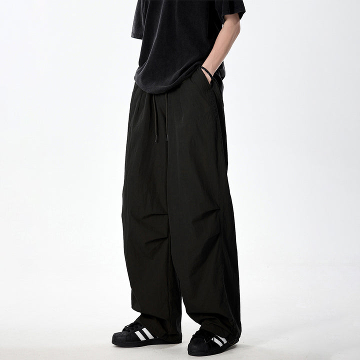Herren Weite Utility-Cargohose mit Tunnelzugbund Knie‑Paneelen und verstellbarem Saum Echo Archiv