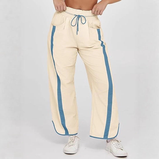 Damen relaxte Trackpants mit seitlichem Kontraststreifen, elastischem Smokbund und Eingrifftaschen – Avélisse