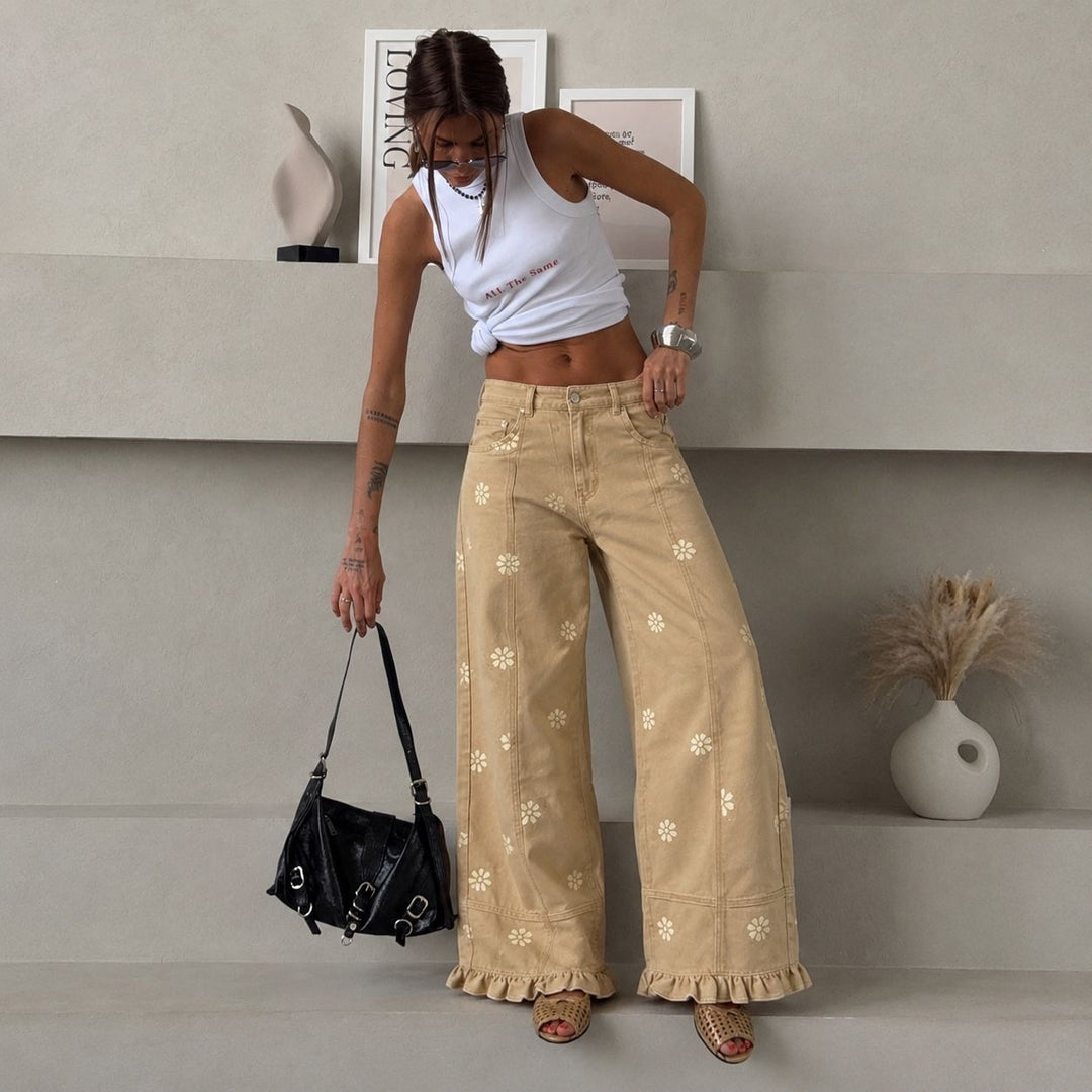 Damen weite Denimhose mit Gänseblümchen-Print, hohem Bund und Rüschenabschluss – Avélisse