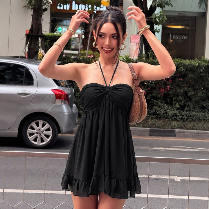 Damen Halter Kleid mit voluminösem Rock und eleganten Rüschendetails Echo Archiv