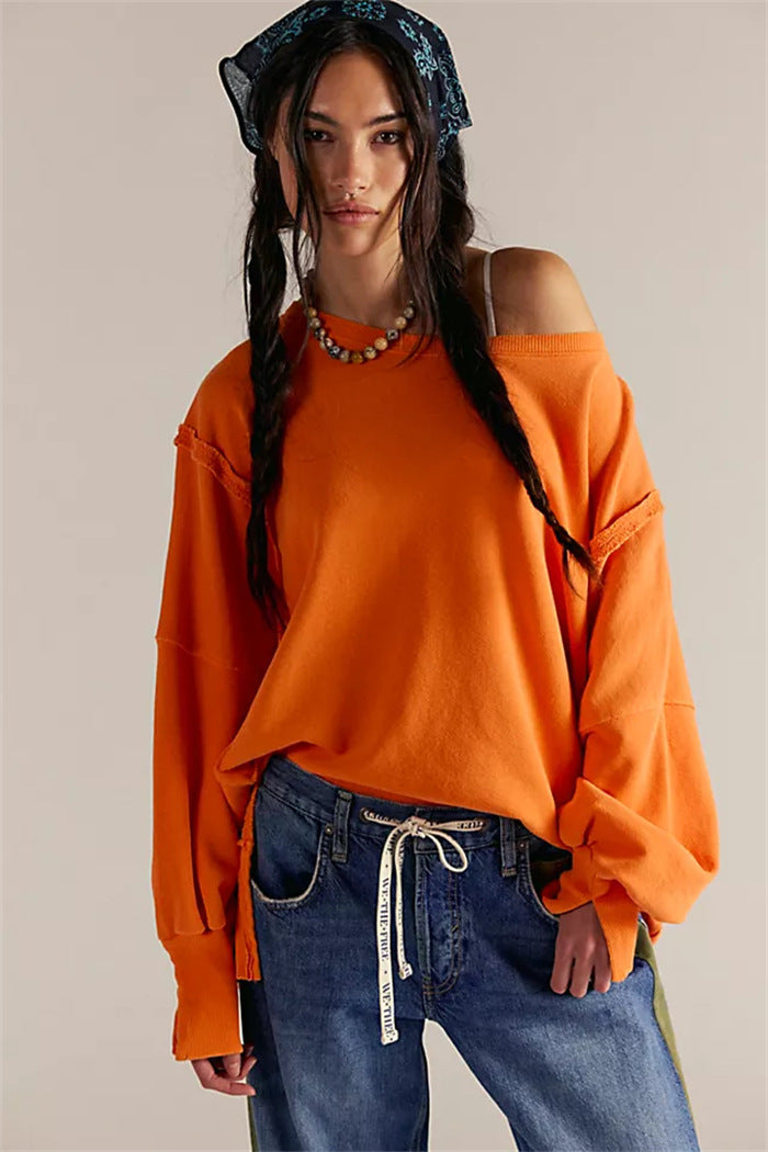 Damen oversized Sweatshirt mit Ballonärmeln, offenen Saumnähten und seitlichen Schlitzen – Avérine