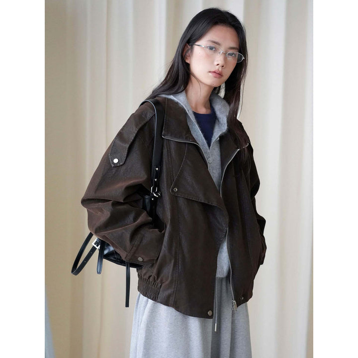 Damen Oversized Lederjacke mit hohem Kragen und asymmetrischer Druckknopfleiste Echoarchiv