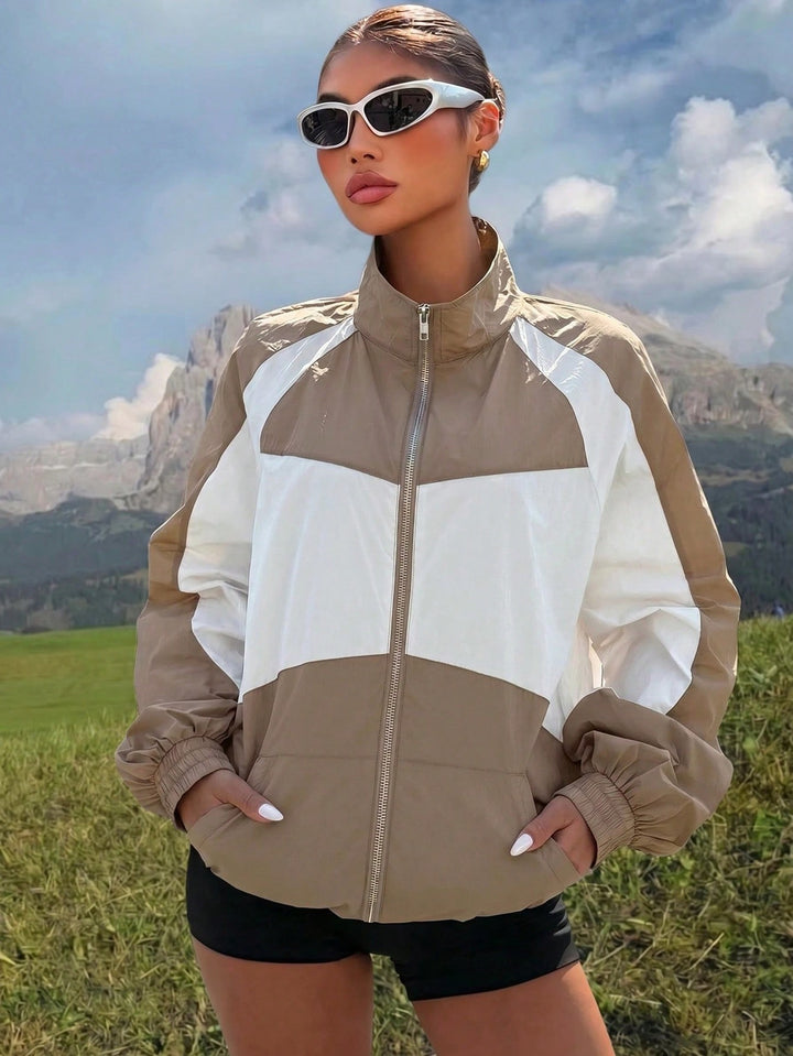 Damen Leichte Windbreaker-Jacke mit Stehkragen, Farbblock-Design und elastischen Bündchen Echo Archiv