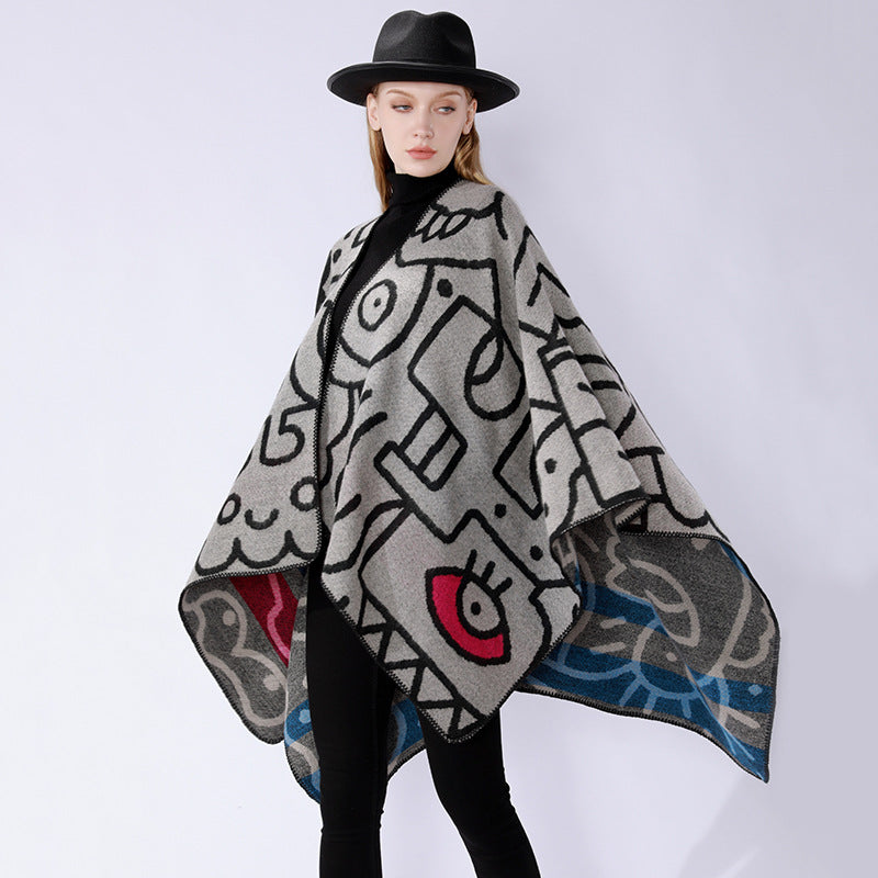 Damen Oversize-Poncho im künstlerischen Print mit zweifarbiger Kantenverarbeitung und asymmetrischem Zipfelsaum – Veloura