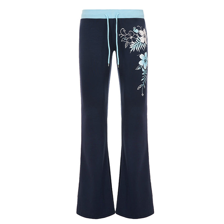 Damen Ausgestellte Lounge-Hose mit Rippbund, Kordelzug und floralem Print – Avélisse