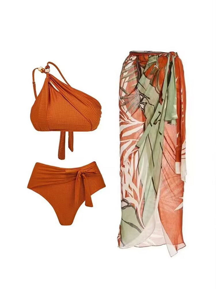 Damen Badeanzug-Set mit asymmetrischem Oberteil und elegantem Sarong Echo Archiv