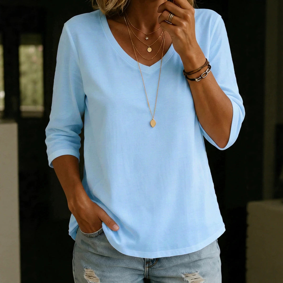 Damen Lockeres V-Ausschnitt-Shirt mit 3/4-Ärmeln und gerundetem Saum – Orélia
