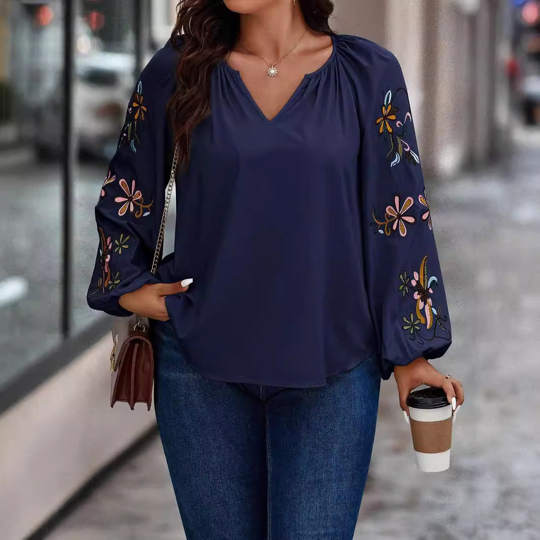 Damen Locker sitzende V-Ausschnitt Bluse mit floraler Stickerei an Ballonärmeln – Élovi
