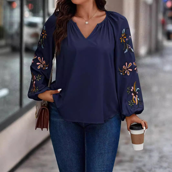 Damen Locker sitzende V-Ausschnitt Bluse mit floraler Stickerei an Ballonärmeln – Élovi