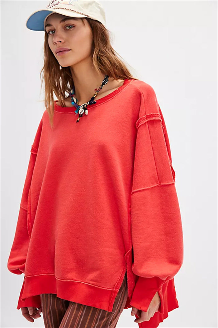 Damen oversized Sweatshirt mit Ballonärmeln, offenen Saumnähten und seitlichen Schlitzen – Avérine