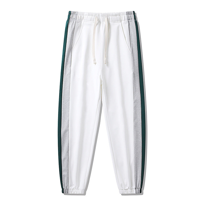 Herren Konische Trackhose mit Kordelzug, seitlichen Colorblock‑Streifen & elastischen Bündchen Echoarchiv