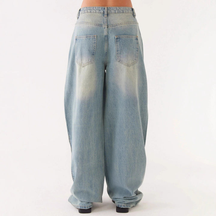 Damen nan oversized Denimjacke mit heller Vintage-Waschung, aufgesetzten Brusttaschen und verlängerten Manschetten Echo Archiv