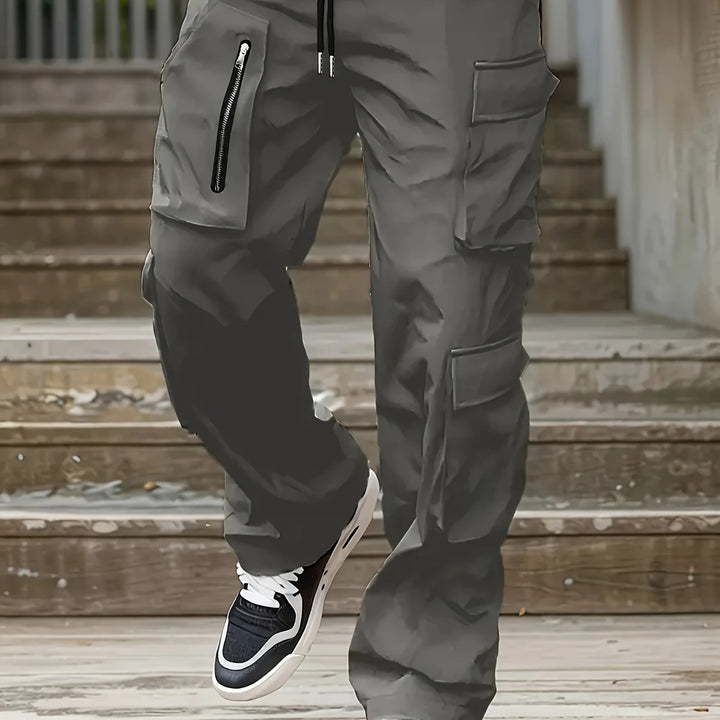 Herren Weite Cargo-Jogginghose mit multifunktionalen Taschen, Reißverschlussdetail und Kordelzugbund Echo Archiv