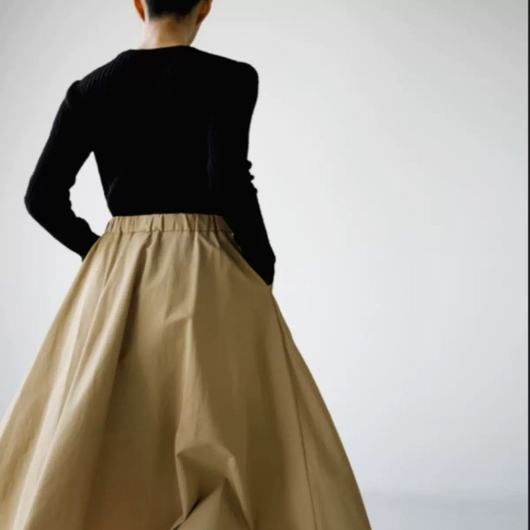 Damen Weit schwingender Midirock mit Gummibund und Eingrifftaschen Echoarchiv