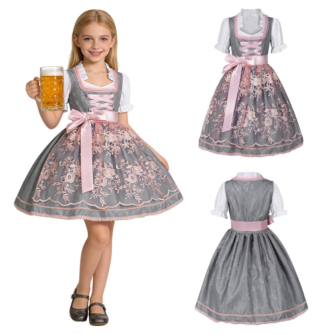 Damen nan traditionelles Kinderdirndl mit bestickter Schürze und Rüschenbluse Echo Archiv