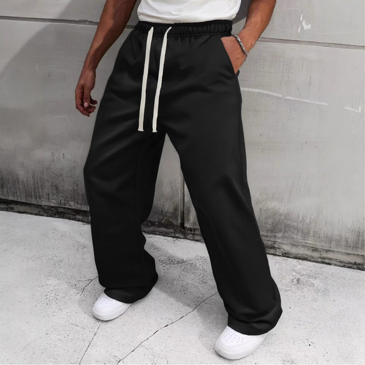 Herren Baggy-Jogginghose im Urban-Utility-Stil mit extra weitem Bein und sichtbarem Kordelzug Echo Archiv