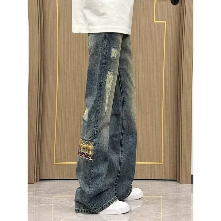 Herren trendige Jeans im lässigen Bootcut-Stil mit einzigartigen Applikationen Echoarchiv