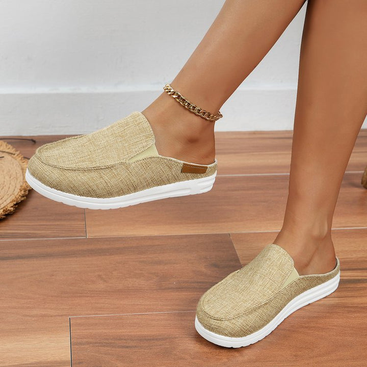 Damen  Slip-On Canvas‑Mules mit Kuhfleckenprint, gepolstertem Komfortfußbett und rutschfester Leichtsohle Echo Archiv