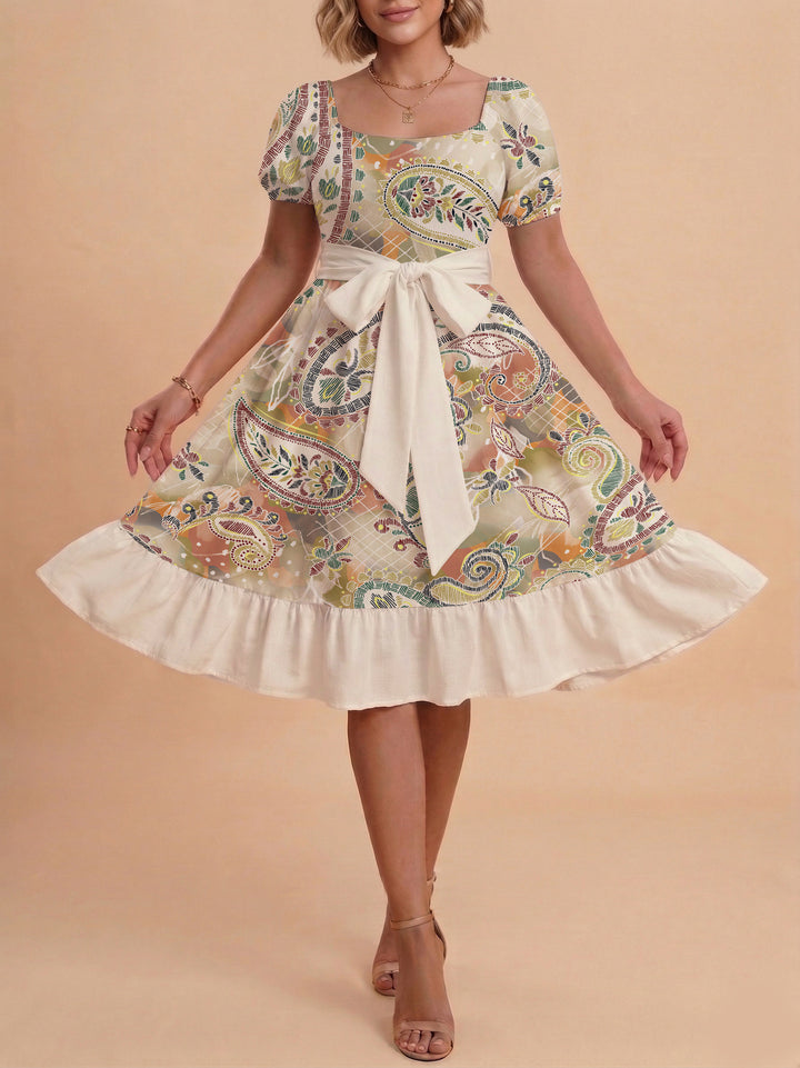 Damen modernes Blumenkleid mit elegantem Taillengürtel und asymmetrischem Saum Echo Archiv