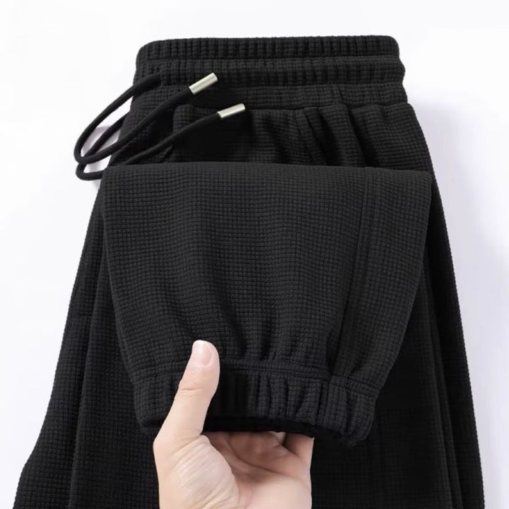 Herren Sportliche Sweatpants mit strukturiertem Material Echoarchiv