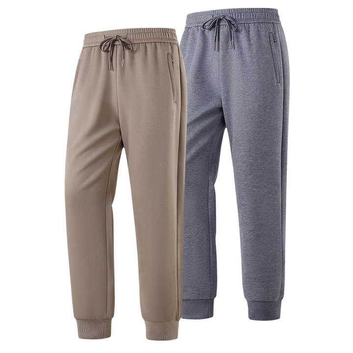 Herren Slim-Fit Freizeithose aus atmungsaktivem Funktionsfleece mit Kordelbund, Reißverschlusstaschen & Rippbündchen Echoarchiv